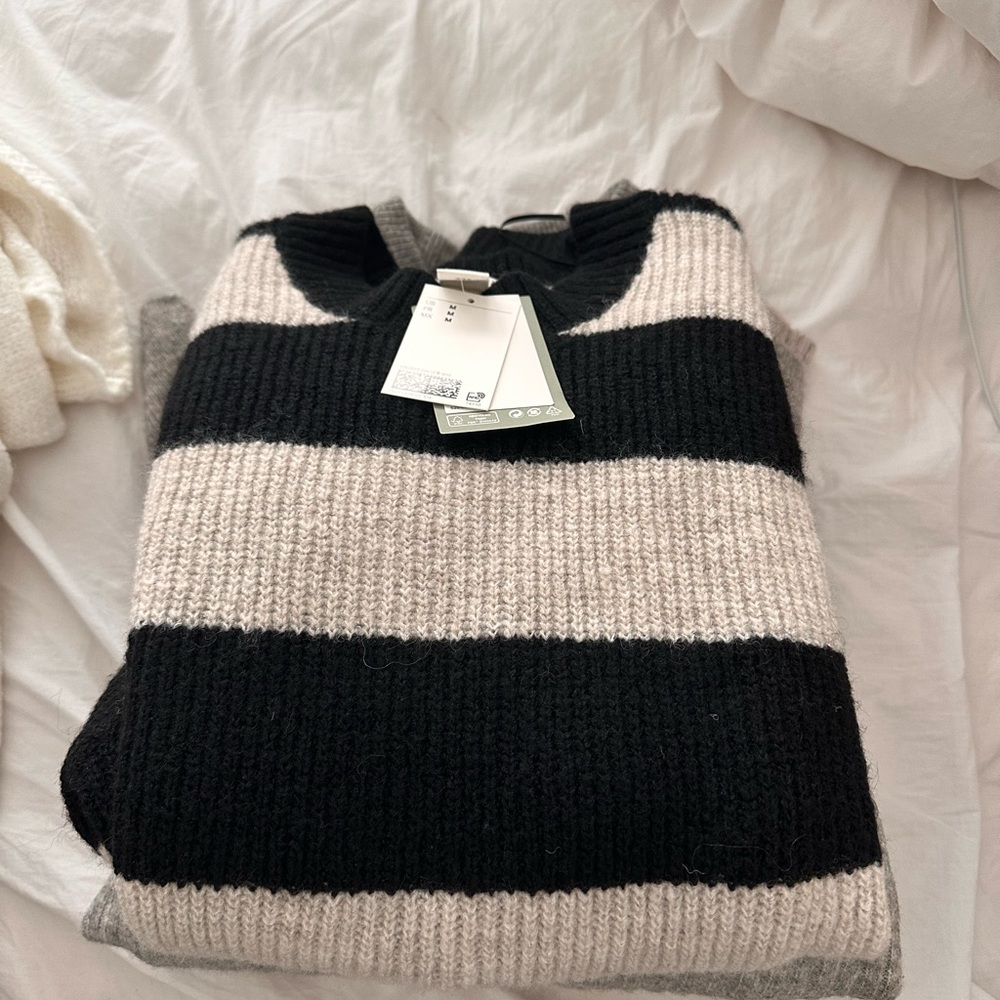 Three h&m slit sweaters